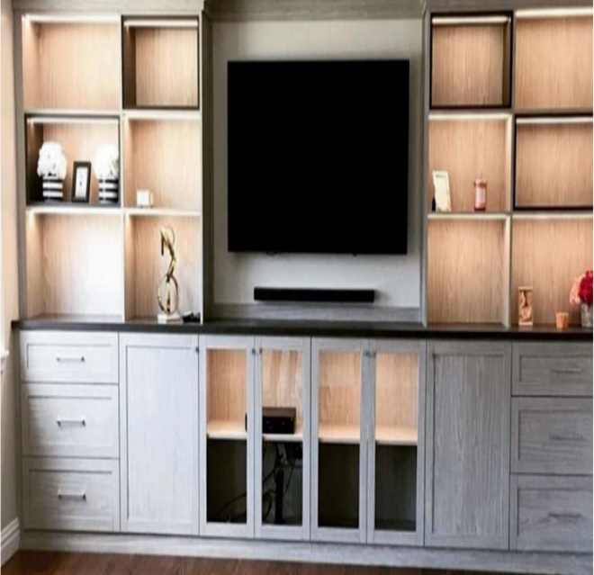 Customized living room entertainment shelves by ShelfGenie of Cincinnati.