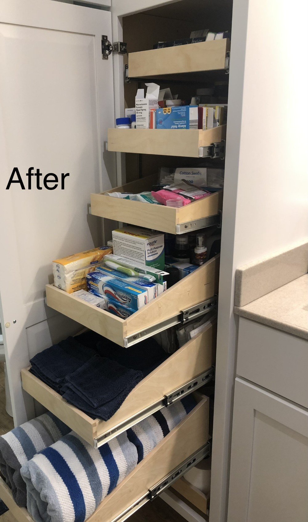 THis bathroom pantry had 5 shelves before we started and after we were able to add 2 extra.
