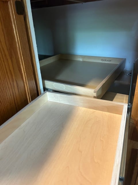 This is our blind corner solution. No more digging everything out of the front to get to that one thing you need in the back.