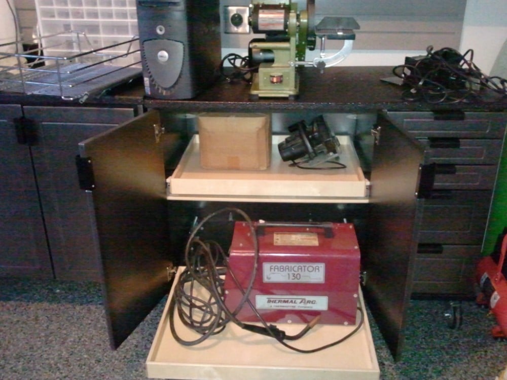 These GlideOuts used 200lb rails and heavy-duty drawer boxes to allow easier access to this welder.
