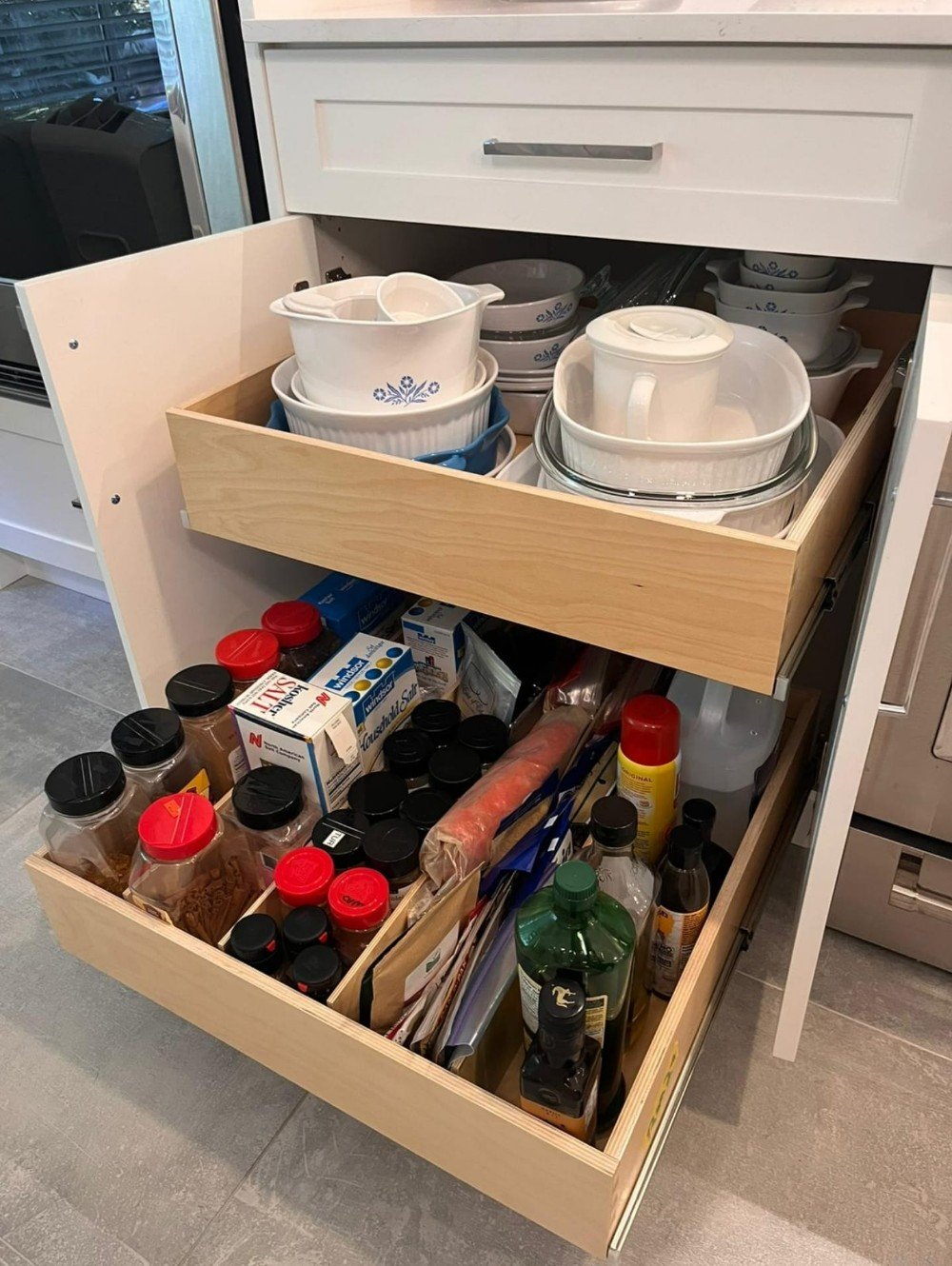lower cabinets, glide-out shelves, pull-out pot drawers, spice organizer, slide out shelving