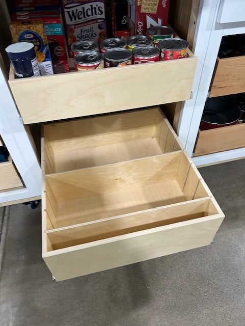 this sis great for the bottom of the pantry. Now your bottles won't fall over. These dividers are adjustable and you can change them whenever you need to.