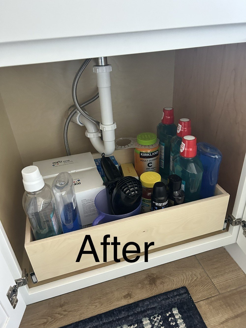 Here we installed a triple glide out under the bathroom sink.