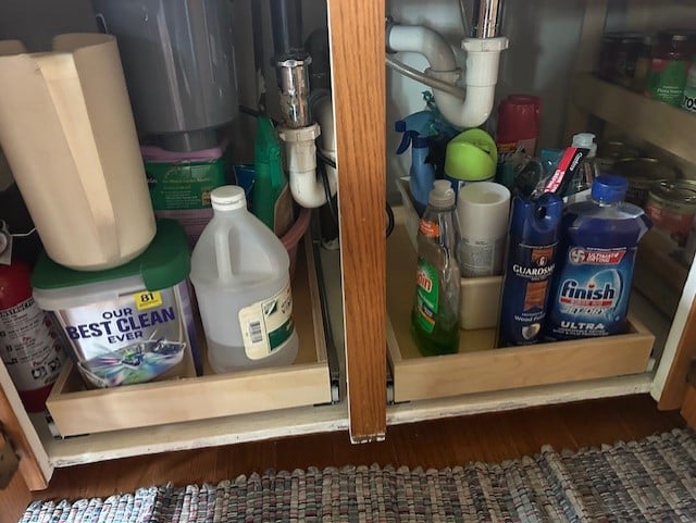 We installed 2 glide outs under this customers kitchen sink. Now she can reach everything in the black hole under the sink.