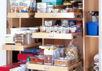 Organized pantry with tons of shelving and storage.