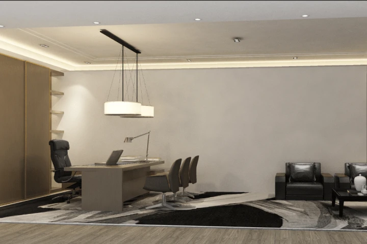 A room with a desk and chairs.