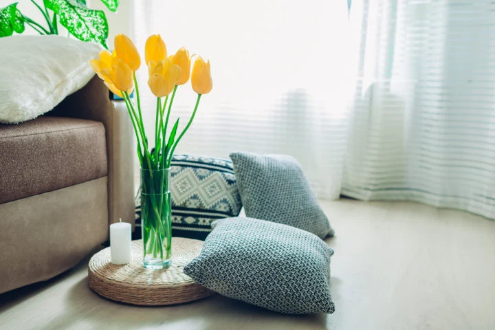 Floor pillows add texture and color and they&rsquo;re easy to store when not in use!