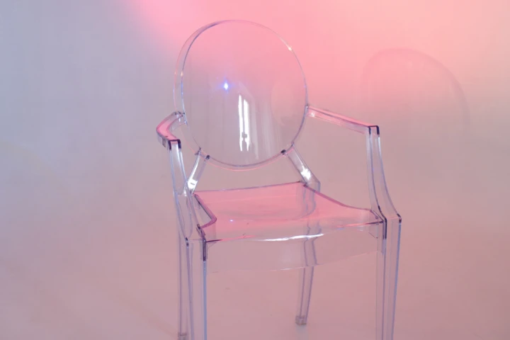 Clear acrylic furniture is sleek and modern while also opening up the space.