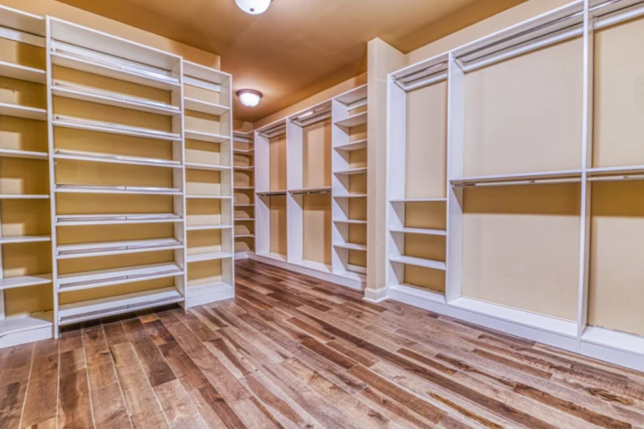 Spacious wooden Closet shelving.