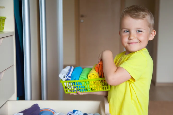 Bins as part of kids closet ideas.