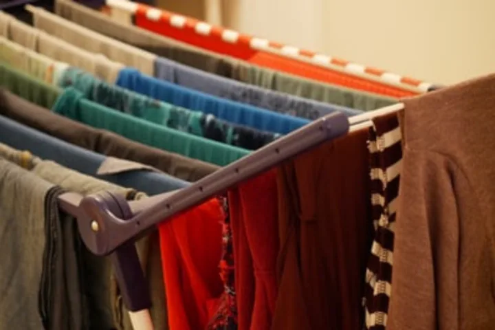 Foldable clothes rack as laundry room storage ideas.